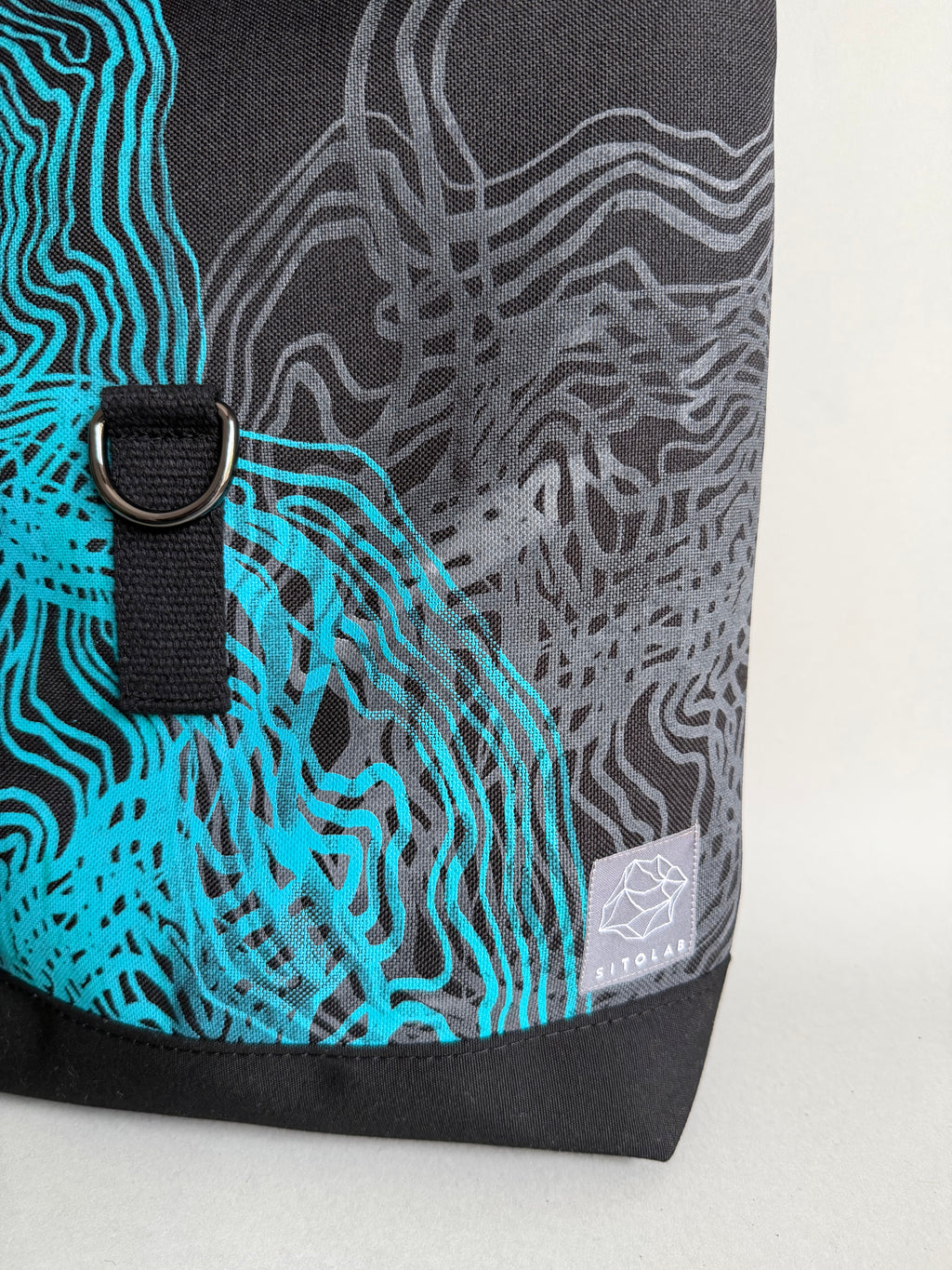 SITOLAB BLACK BACKPACK WITH TURQUISE SWIRL PRINT