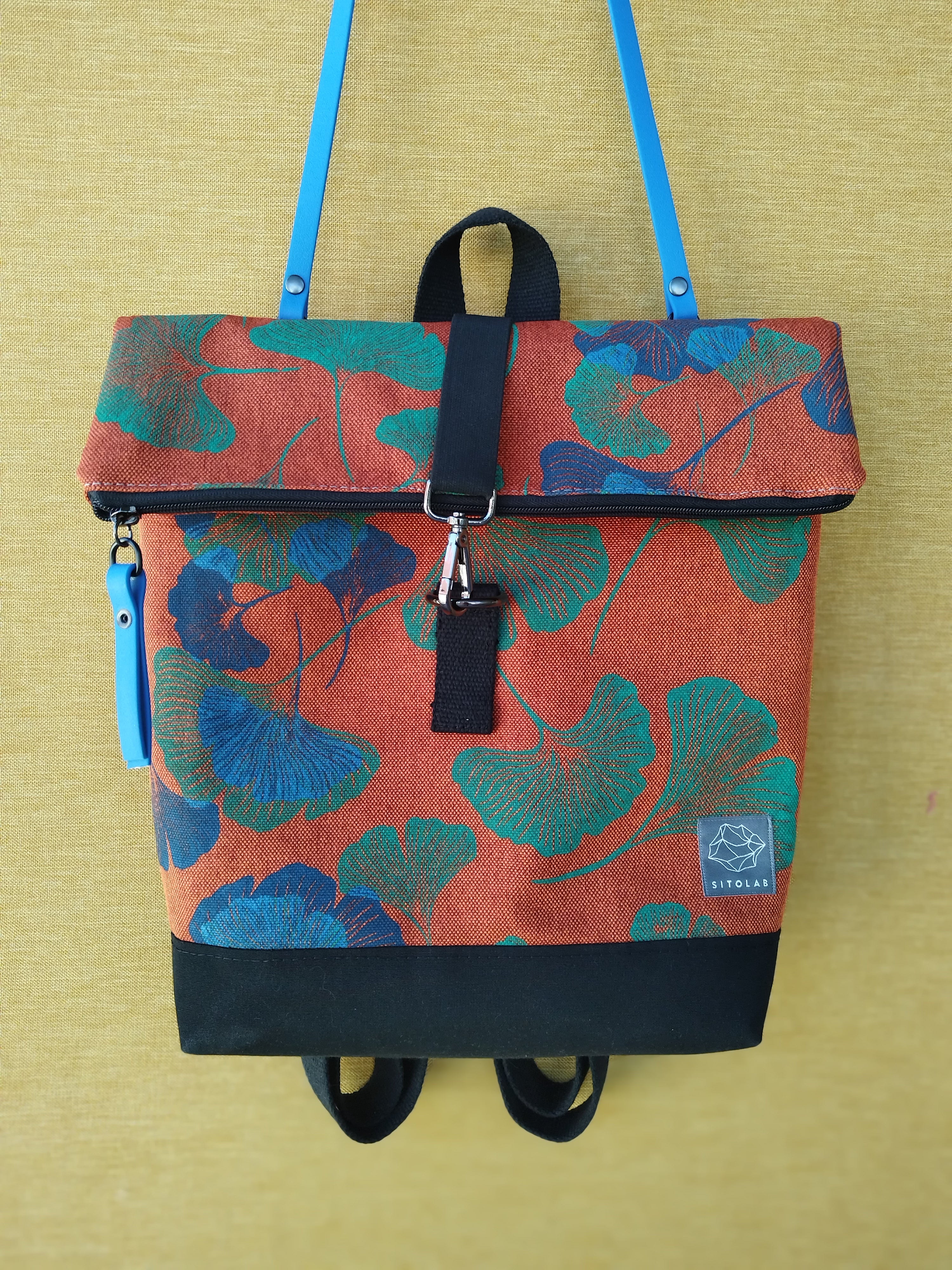 SITOLAB ORANGE GINKO BACKPACK WITH BLUE DETAILS